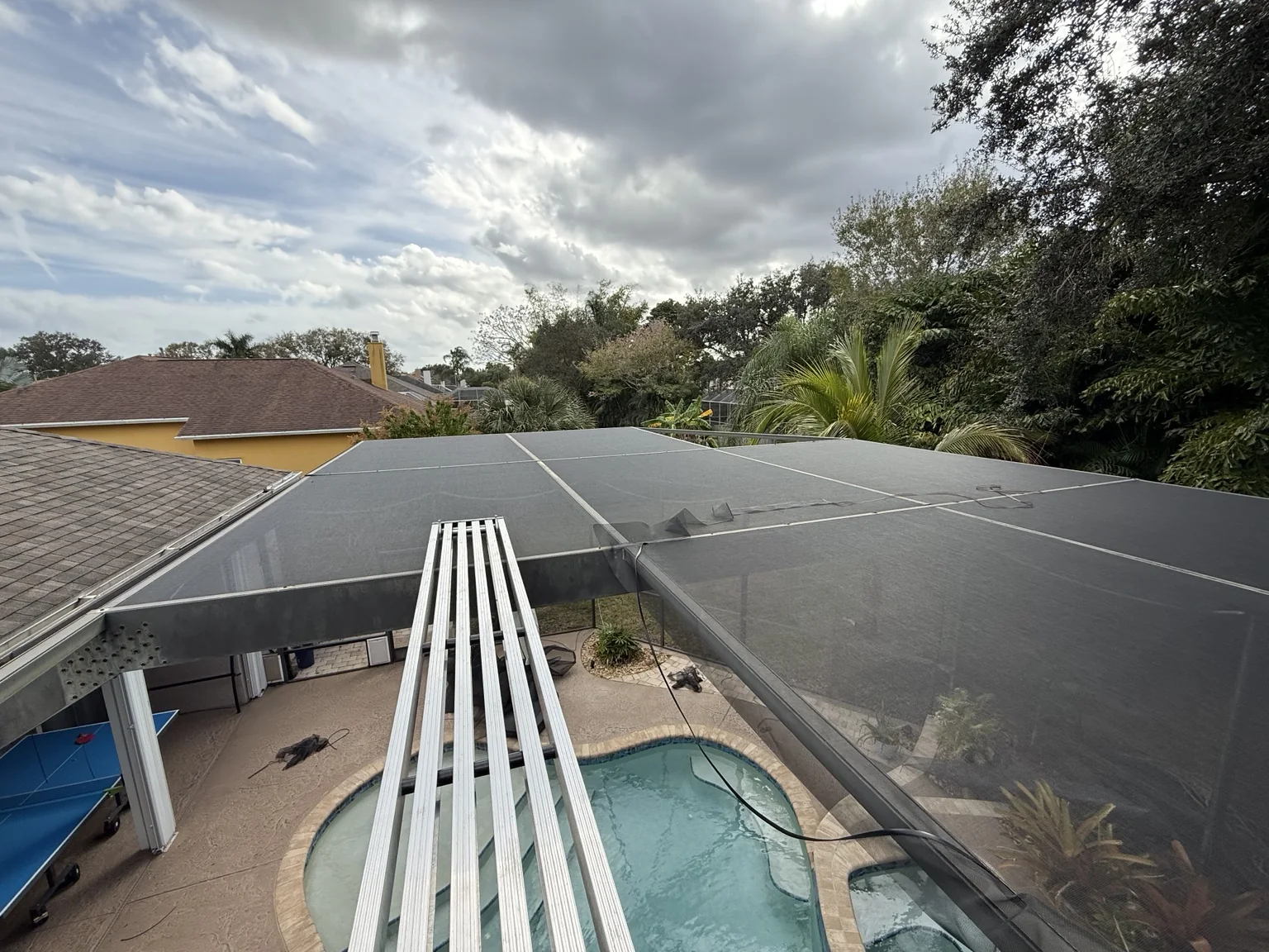 Completed full pool enclosure rescreen in Rockledge, Florida