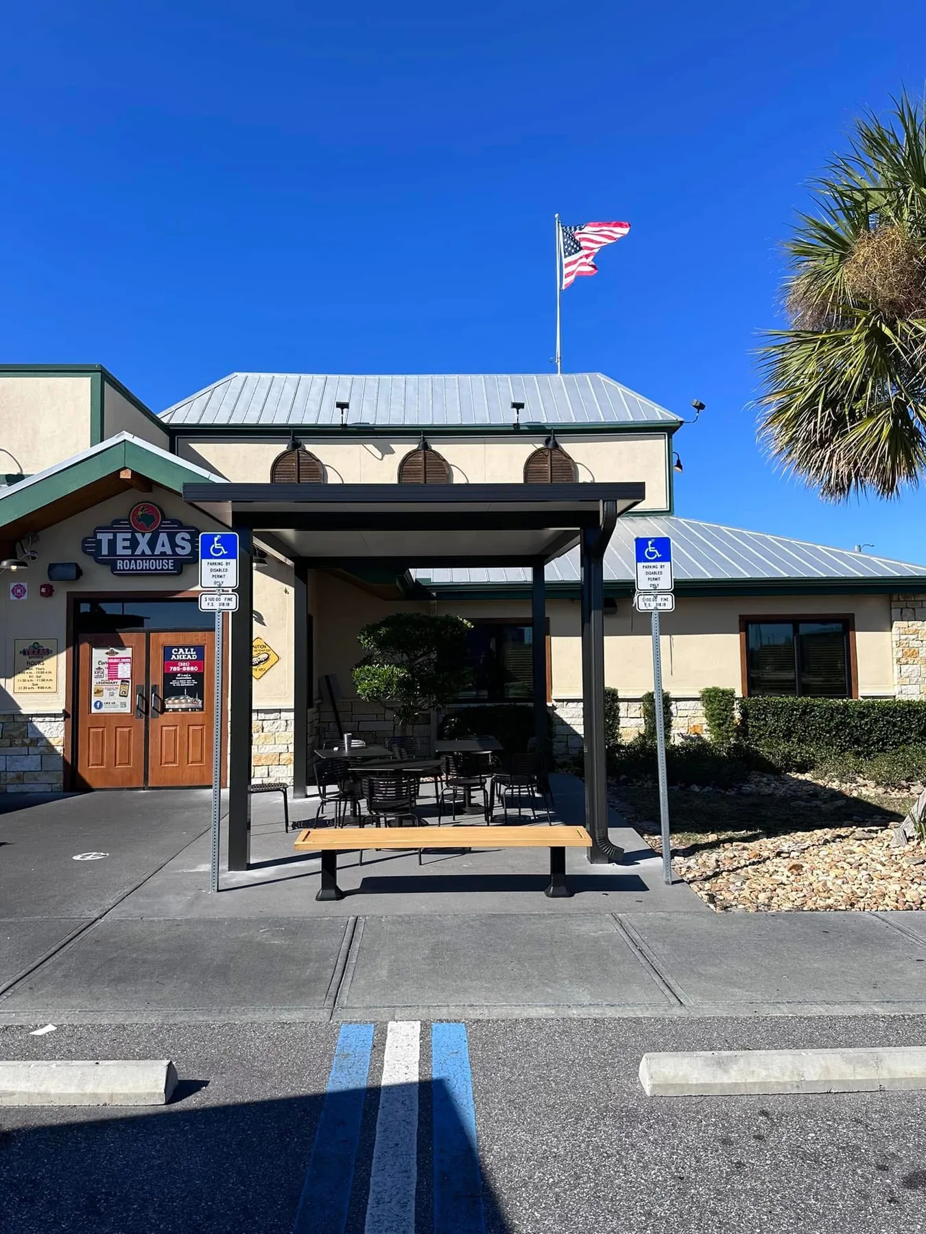 Custom commercial canopy installation for a restaurant property.