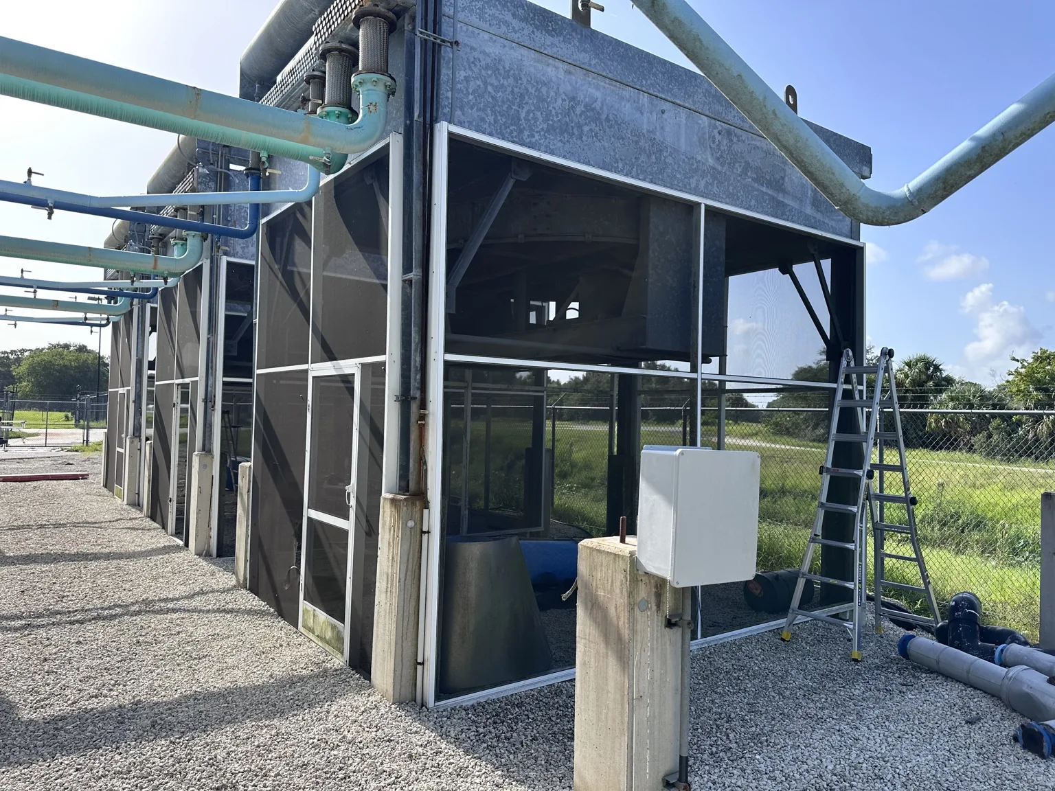 Specialty enclosure work built around piping, equipment, and existing infrastructure.