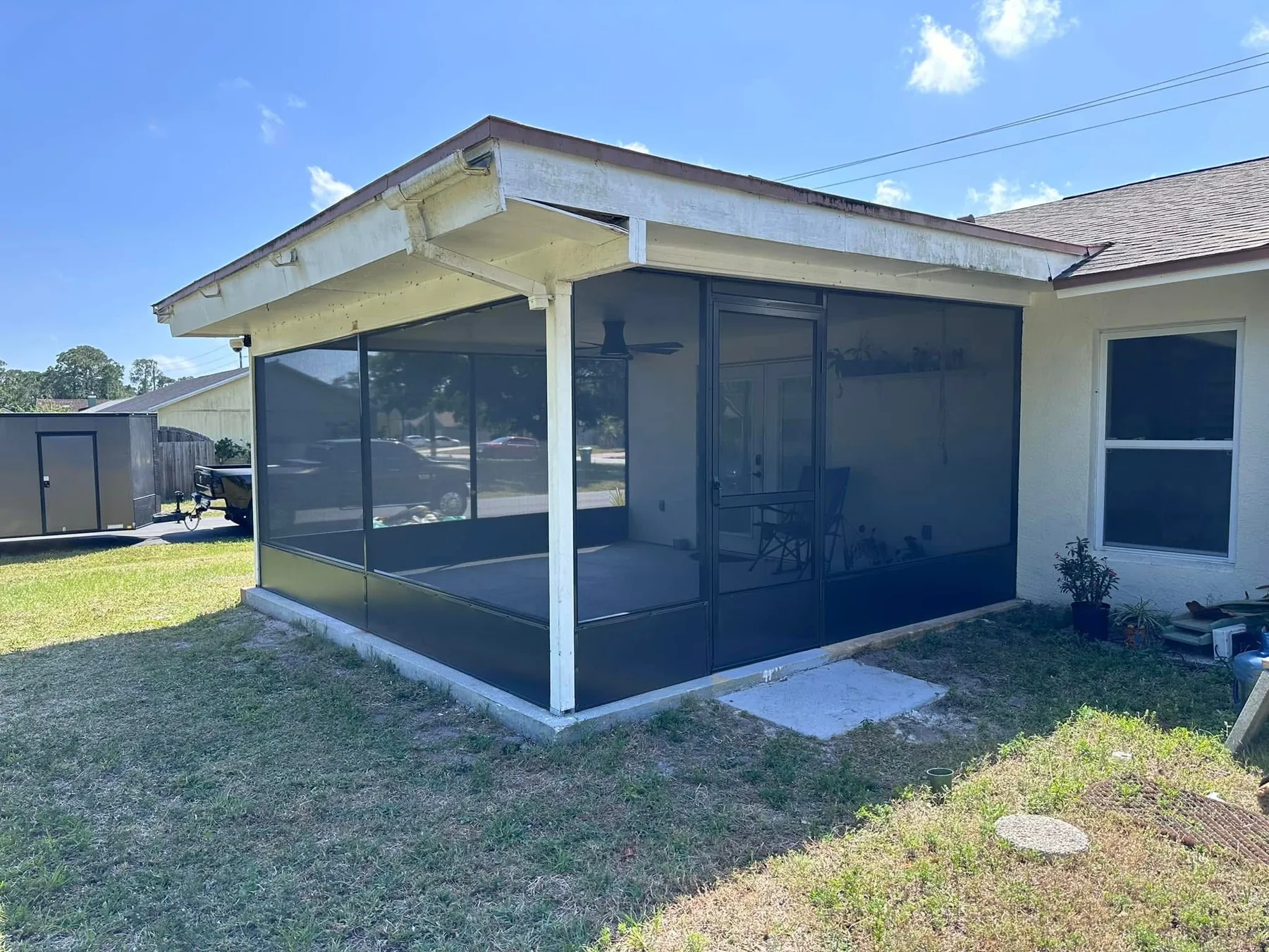 Upgraded enclosure with all-new extrusion, screening, lower panels, and door.