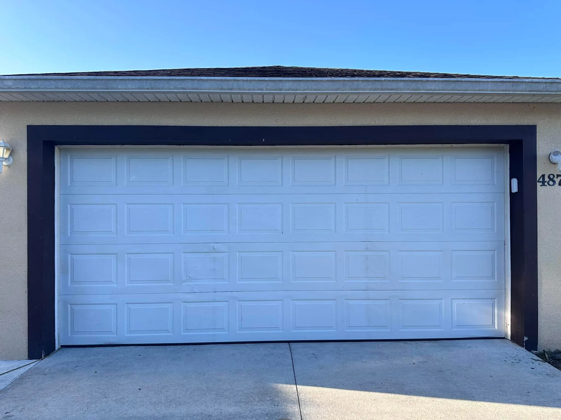 Garage opening before the screen system was installed.