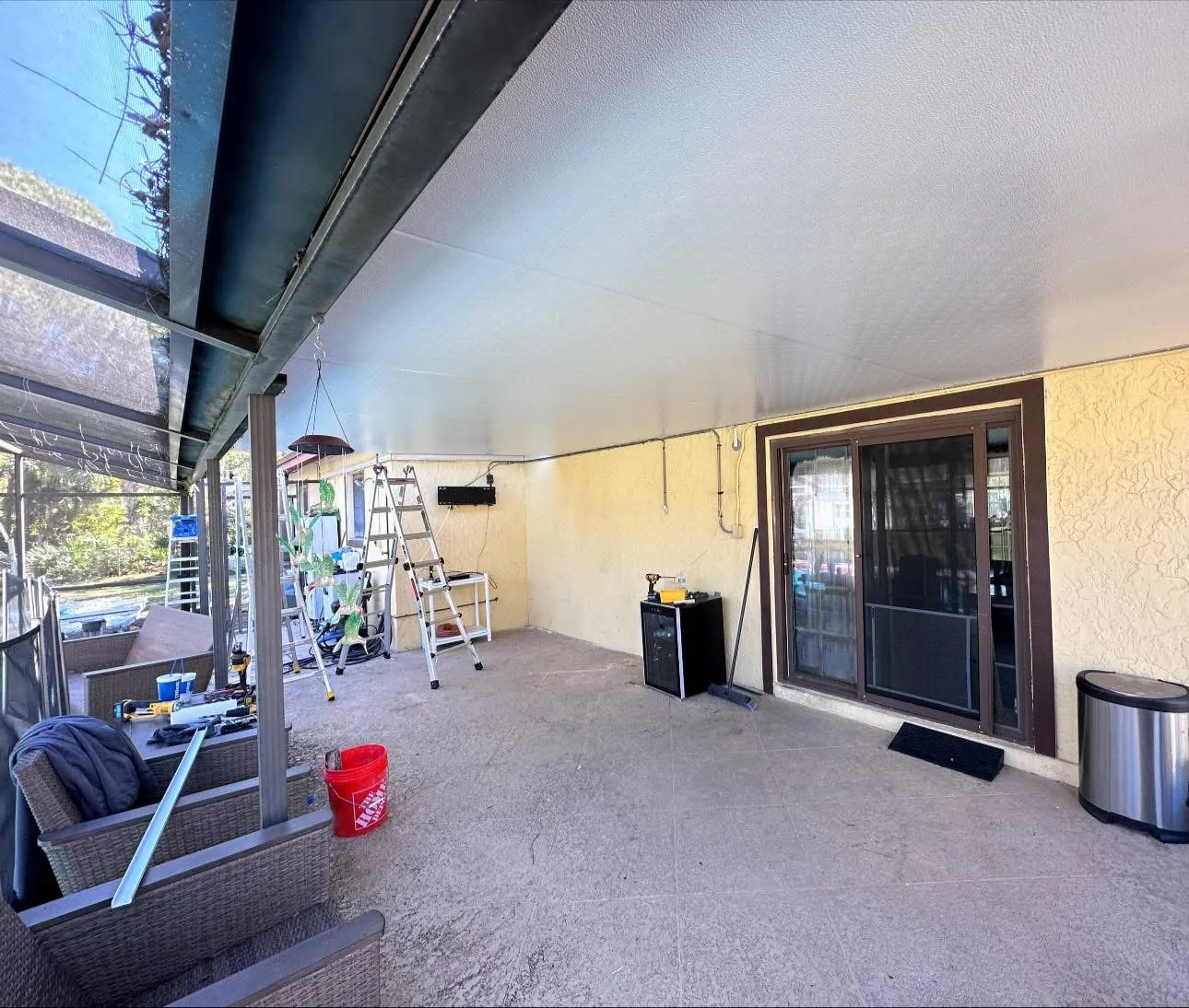 Roof repaired and upgraded to insulated panels for a clean, durable finished space.